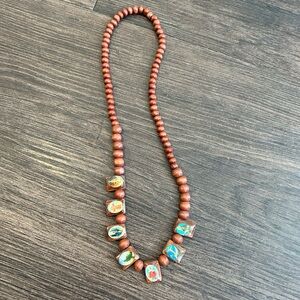 Handcrafted Wooden Bead Necklace with Artistic Accents